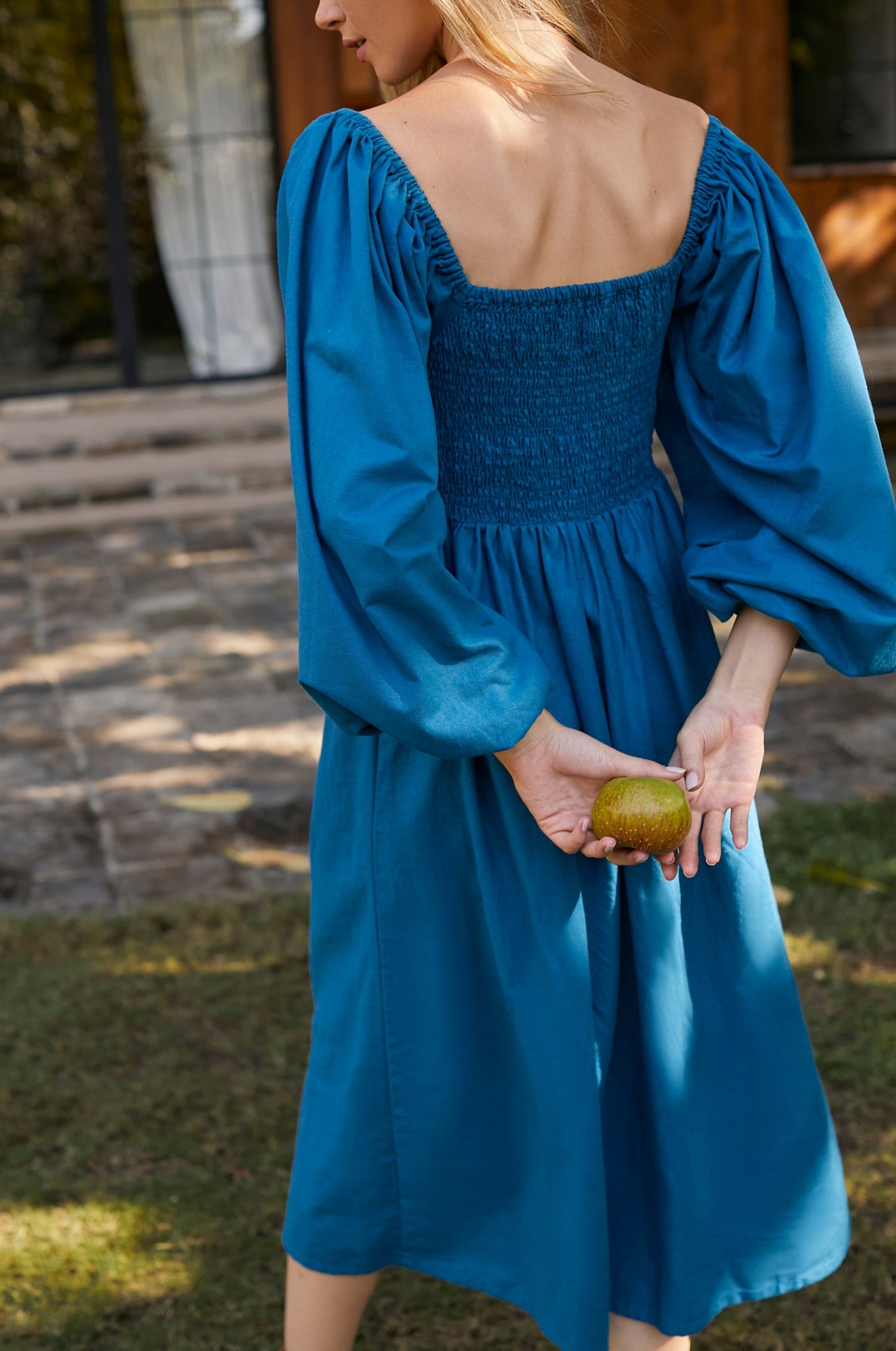 The Alila Smocked Linen Midi Dress